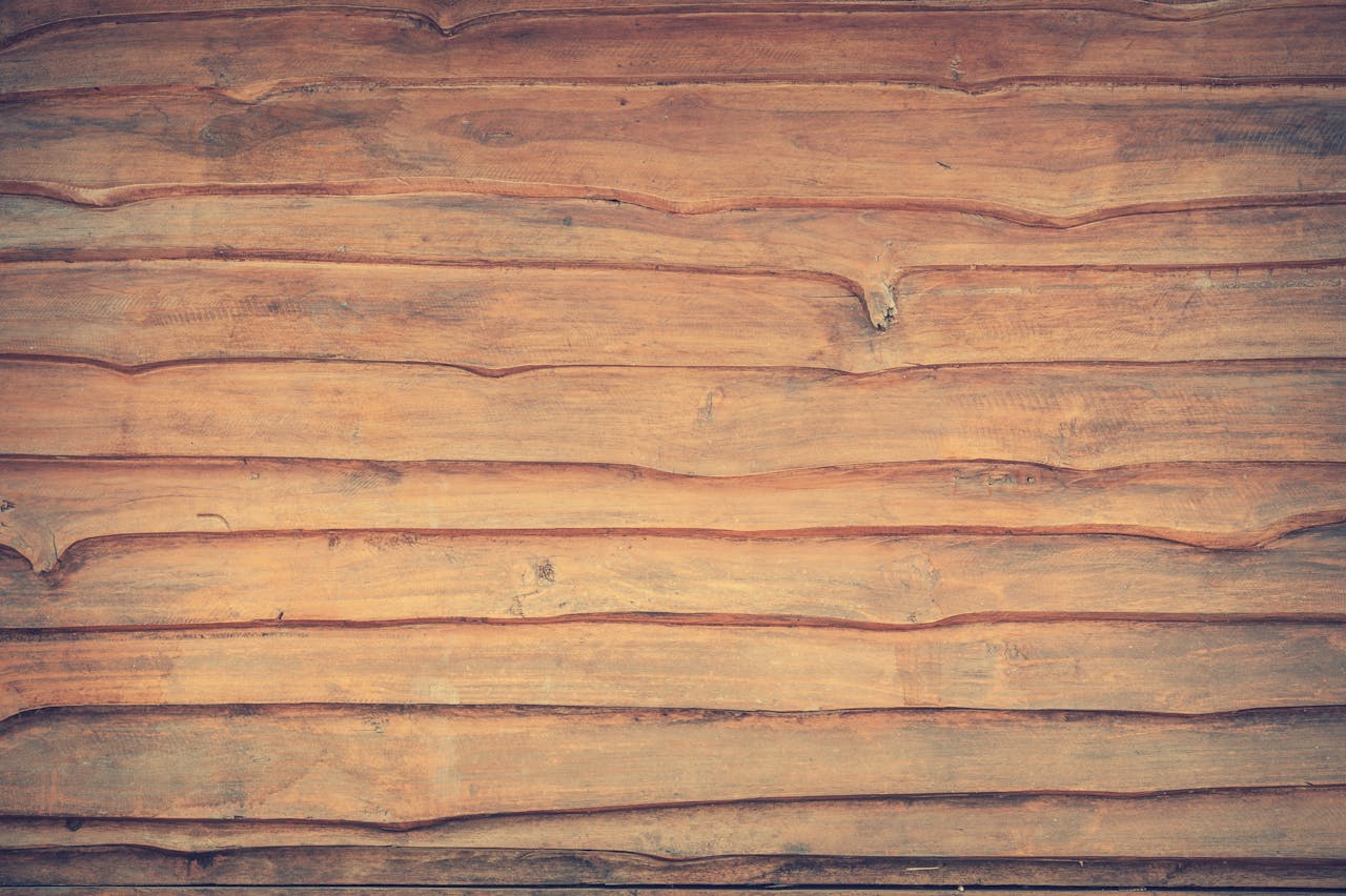 High-resolution image of textured wooden planks with a vintage finish.